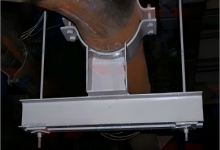 Pipe clamp seat for cross-bore spring-steellab